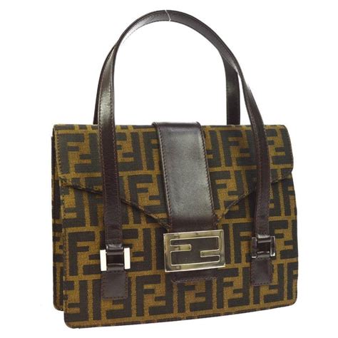 fendi logo canvas bag front buckle|fendi top handle bag.